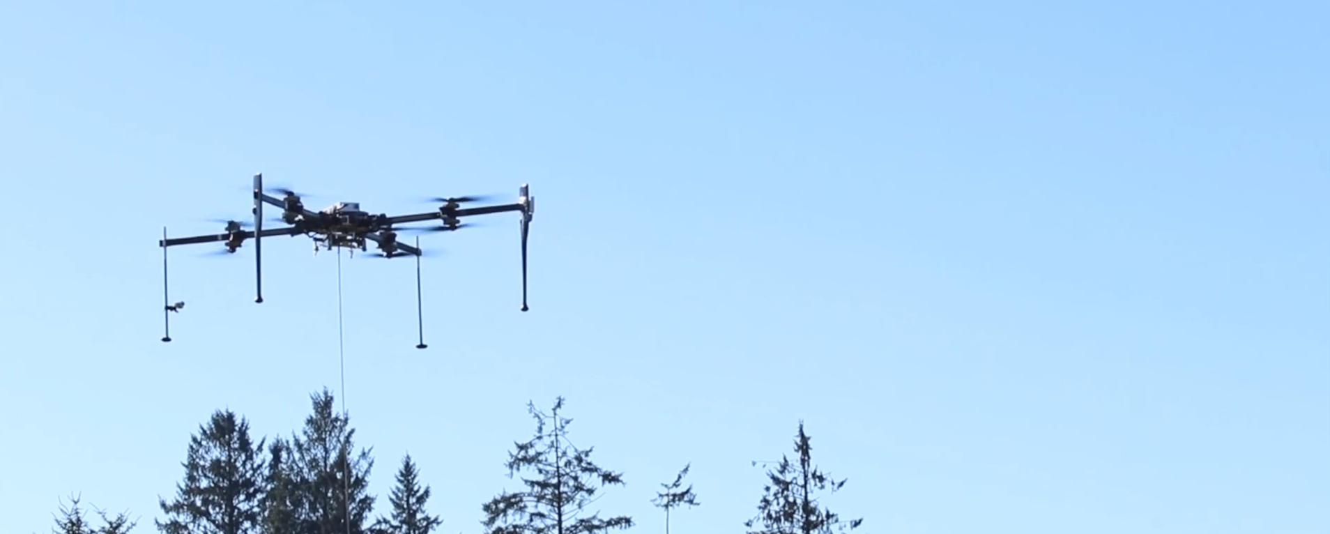 Hood Tech's VTOL operation in a forest clearing